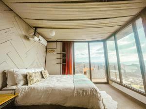 Letto o letti in una camera di Native Residence