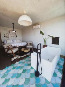 Letto o letti in una camera di Native Residence