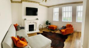 พื้นที่นั่งเล่นของ Stunning 3 bed residential home in Sheffield