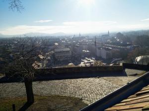a view of a city from the top of a building at City-Top Panorama House & Apartments in Esztergom