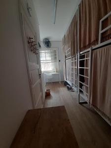 Postel nebo postele na pokoji v ubytování Angatu Hostel