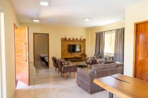 Μια τηλεόραση ή/και κέντρο ψυχαγωγίας στο Casa com Piscina Armação de Búzios