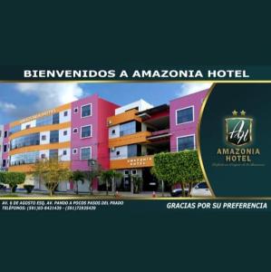 un poster per un hotel amazonania con un edificio di Amazonia Hotel a Cobija