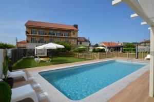 Bazén v ubytovaní Hotel Cachada alebo v jeho blízkosti
