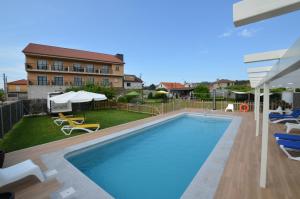 Bazén v ubytovaní Hotel Cachada alebo v jeho blízkosti
