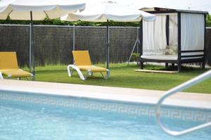 Bazén v ubytovaní Hotel Cachada alebo v jeho blízkosti