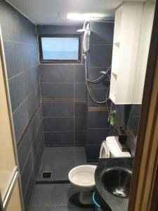 Koupelna v ubytování Putra Villa Condo