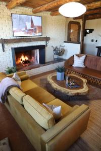 A seating area at CASITA MISTICA Farm House at El Mistico