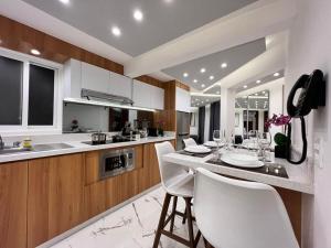 A kitchen or kitchenette at Seven Boutique Apartments Cancún