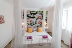 Postel nebo postele na pokoji v ubytování Apartments Vintage