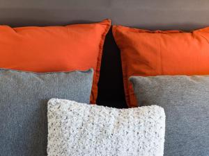 a group of pillows sitting next to each other at Hyper centre chambre au calme in Lille