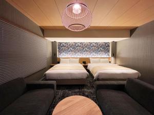 Voodi või voodid majutusasutuse Rinn Gion Shirakawa toas