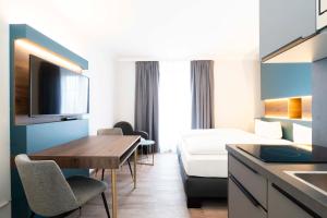 Postel nebo postele na pokoji v ubytování Hotel Rosenhof bei Bamberg + 37 fotografií