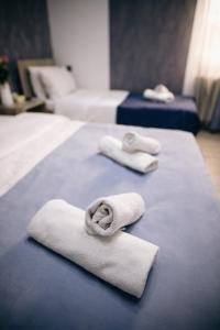 Postel nebo postele na pokoji v ubytování Nuryan Hotel Yerevan
