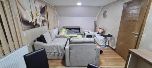 Χώρος καθιστικού στο Apartmani Ognjen