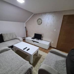 Χώρος καθιστικού στο Apartmani Ognjen
