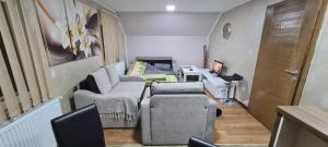 Χώρος καθιστικού στο Apartmani Ognjen