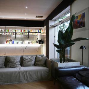 a living room with a couch and a window at Saint Joseph in Salerno