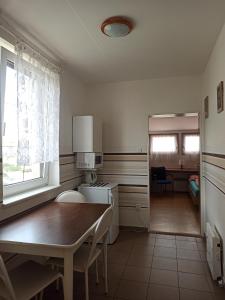 Postel nebo postele na pokoji v ubytování Penzion Pasohlávky