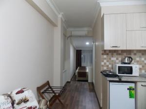 Kuchyň nebo kuchyňský kout v ubytování BeyazitHan Suites Old City
