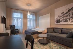Posezení v ubytování Aparthotel Rimska 14