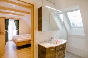 Ένα ή περισσότερα κρεβάτια σε δωμάτιο στο Gästezimmer Steiner