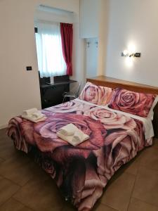 Postel nebo postele na pokoji v ubytování Accomodation Verona - City Centre