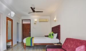 Postel nebo postele na pokoji v ubytování Santa Monica Resort - Calangute