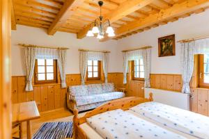 Voodi või voodid majutusasutuse Gästezimmer Steiner toas