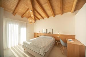 Domu Simius Life Style Hotel客房内的一张或多张床位