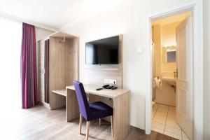TV a/nebo společenská místnost v ubytování Hotel Rosenhof bei Bamberg