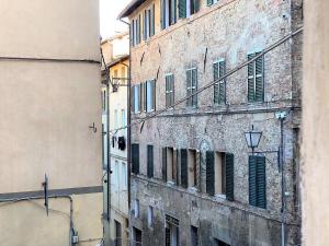 Afbeelding uit fotogalerij van CASA STELLA- a due passi dal corso di Siena in Siena