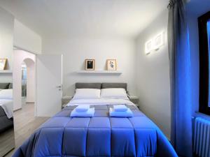เตียงในห้องที่ CASA STELLA- a due passi dal corso di Siena