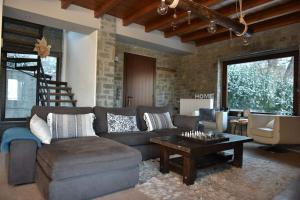 A seating area at Pefkofyto Mountain Retreat