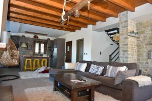 A seating area at Pefkofyto Mountain Retreat