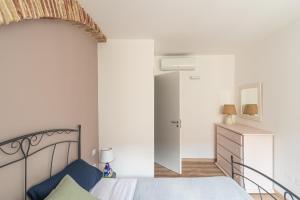 Posteľ alebo postele v izbe v ubytovaní Nice apartment near Piazza Kalsa by Wonderful Italy