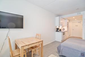 Kuchyň nebo kuchyňský kout v ubytování Holiday In Lapland - Levi Postintie 3B 322
