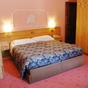 Ein Bett oder Betten in einem Zimmer der Unterkunft Hotel Villanova