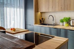 Kuchyňa alebo kuchynka v ubytovaní Apartament Madlen Kalinowa Szczyrk Sauna Grota Solna