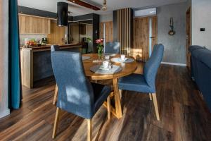 Kuchyňa alebo kuchynka v ubytovaní Apartament Madlen Kalinowa Szczyrk Sauna Grota Solna
