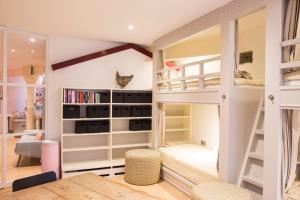 a kids room with bunk beds and a desk at Flo's Atelier - Family studio NOTE studio is adjacent to Flo's apartment in Amsterdam +36 photos