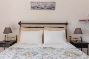 Postel nebo postele na pokoji v ubytování Traditional House @ Chora Astypalea + 5 fotografií