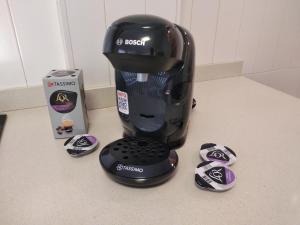 a blender sitting on a counter next to a box at Calpe Star in Calpe +26 photos
