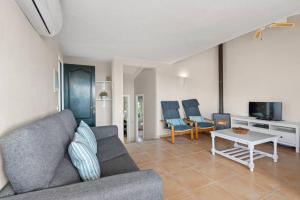 TV a/nebo společenská místnost v ubytování Apartamento Cap Roig
