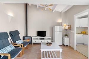 TV a/nebo společenská místnost v ubytování Apartamento Cap Roig