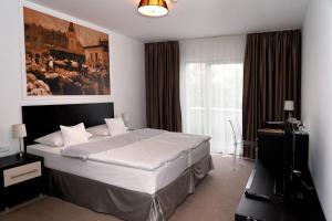 Voodi või voodid majutusasutuse Hotel Mousson toas