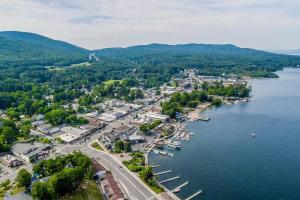 an aerial view of a town next to a body of water at The Inn of Lake George in Lake George