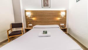 Un pat sau paturi într-o cameră la Pacoche Murcia