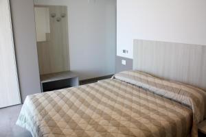 Posteľ alebo postele v izbe v ubytovaní Nashira Apartments