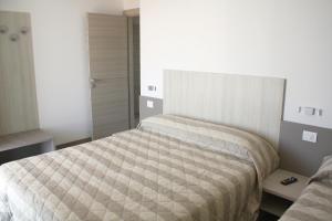 Posteľ alebo postele v izbe v ubytovaní Nashira Apartments